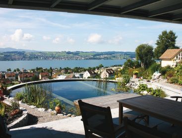 natural pool in Switzerland with view over lake zurich
